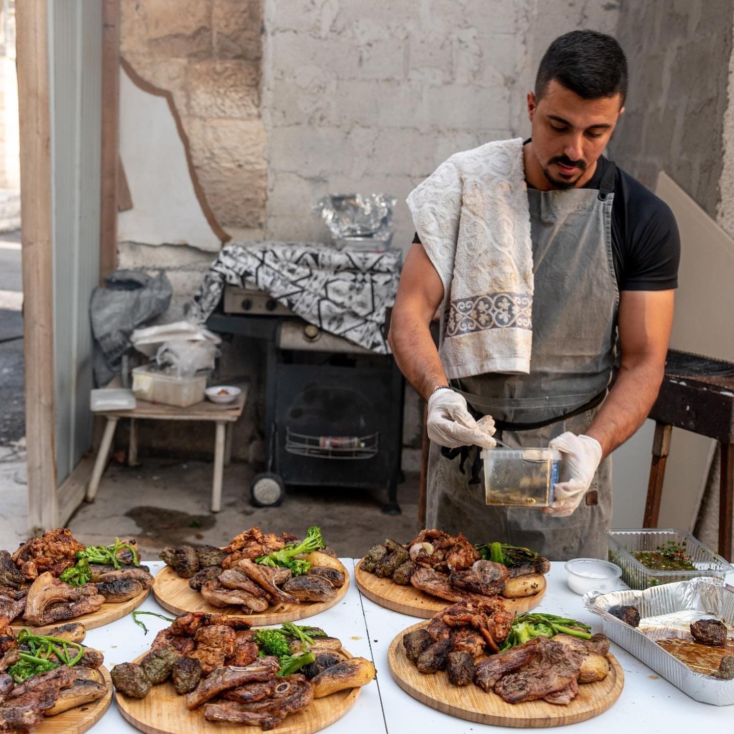 Focaccia's team cooking on the grill on-site at a private event
